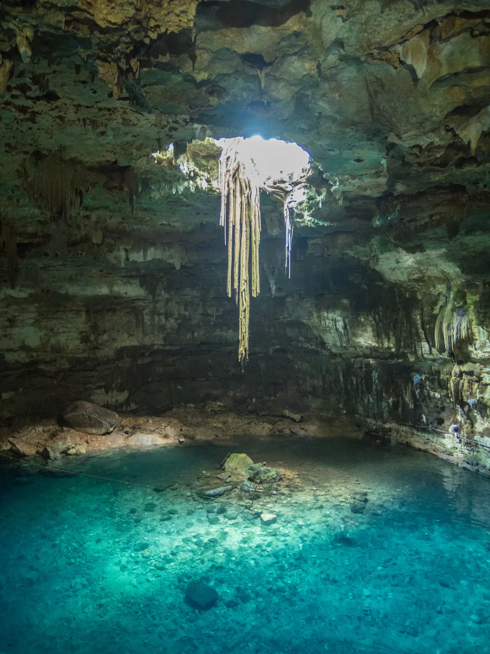 Clear water and limestone at Gran Cenote.